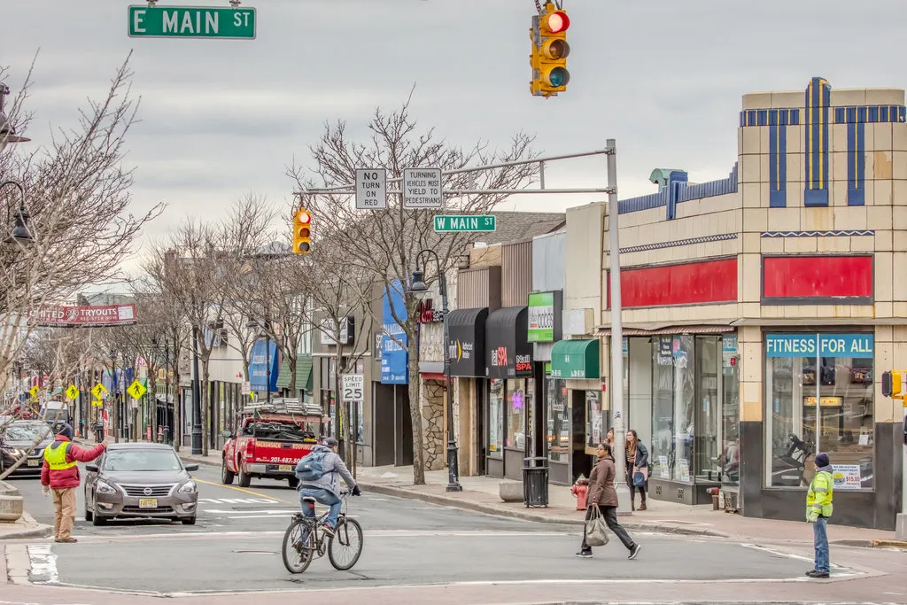 Intersection on Main Street with Pedestrians and Traffic