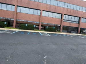 Freshly striped accessible parking spaces in lot